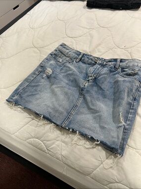 Light Wash Distressed Denim Mini Skirt